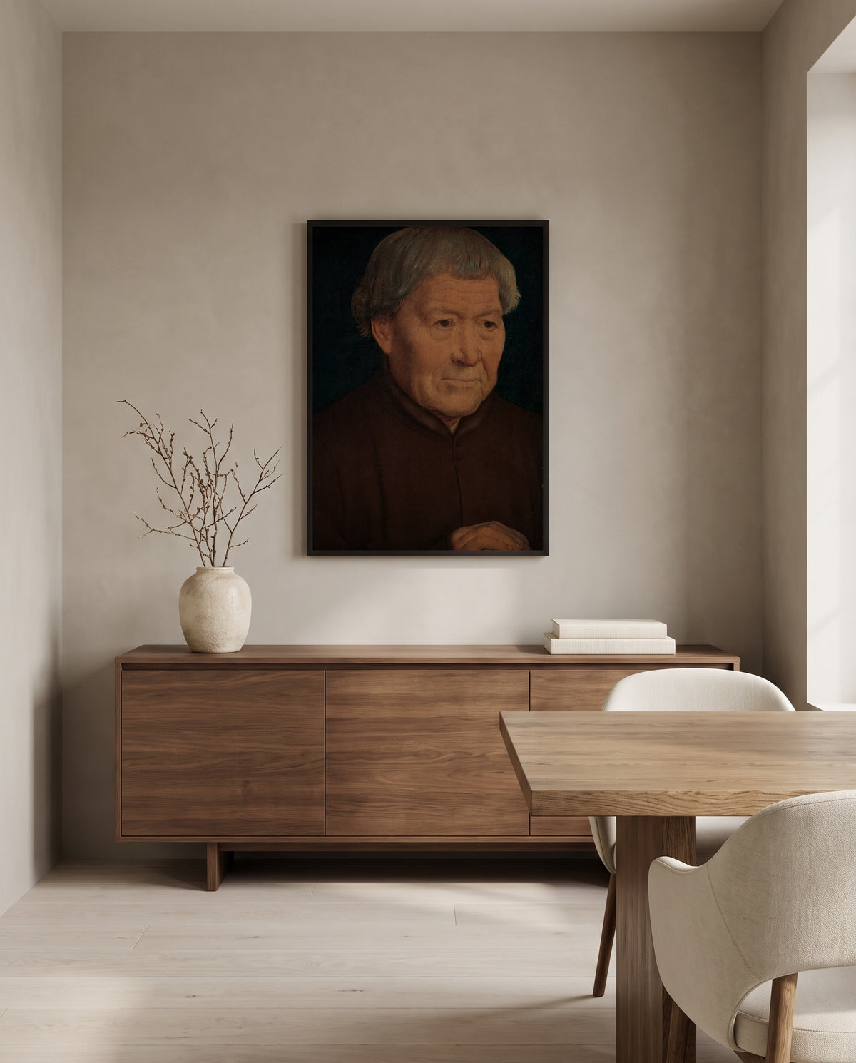 Old Man by Hans Memling in a black frame above a walnut sideboard in a dining room