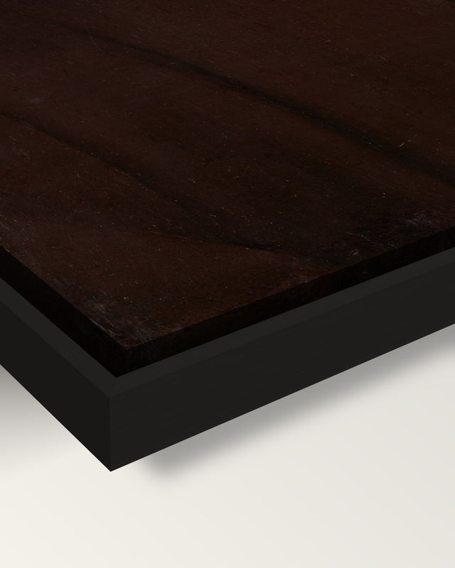 Old Man framed canvas, corner close-up: the canvas in a slim black floating frame, its painted edge in the shadow gap