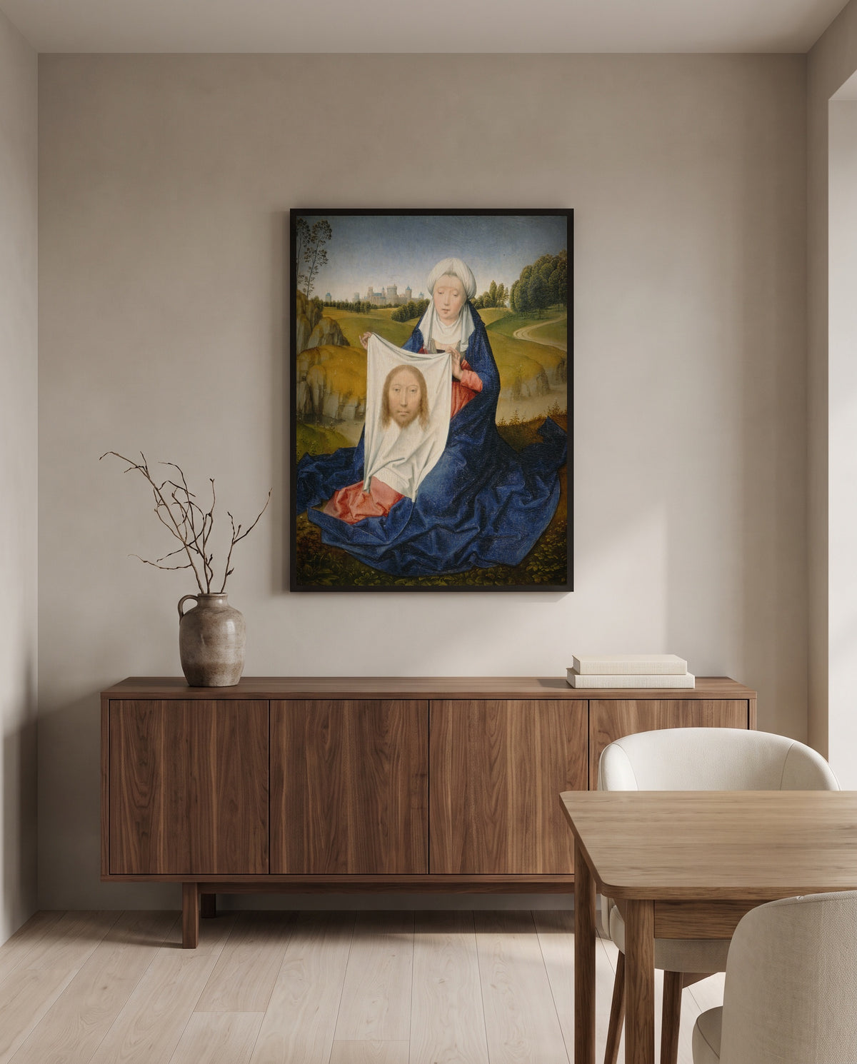 Saint Veronica by Hans Memling in a black frame above a walnut sideboard in a dining room