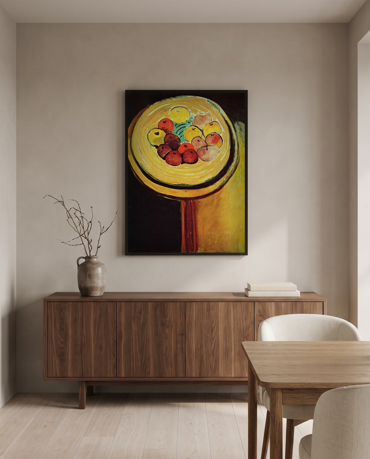 Apples by Henri Matisse in a black frame above a walnut sideboard in a dining room