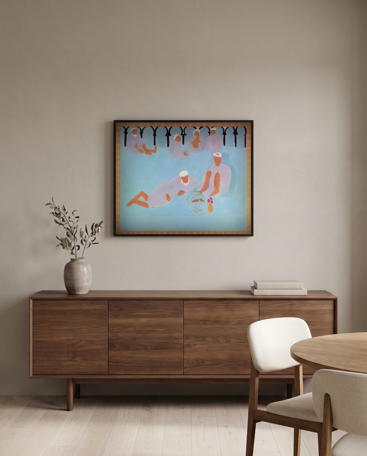 Arab Coffeehouse by Henri Matisse in a black frame above a walnut sideboard in a dining room