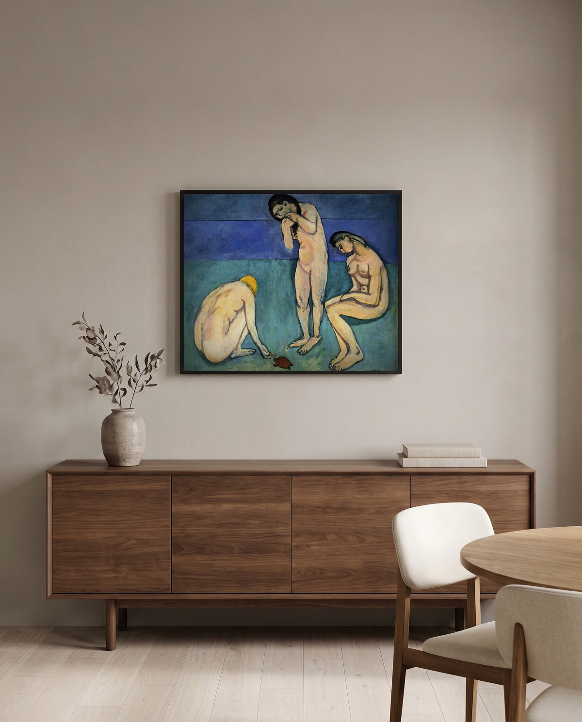 Bathers with a Turtle by Henri Matisse in a black frame above a walnut sideboard in a dining room