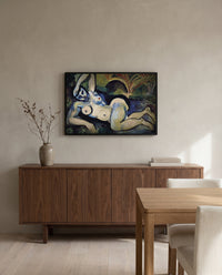 Blue Nude by Henri Matisse in a black frame above a walnut sideboard in a dining room