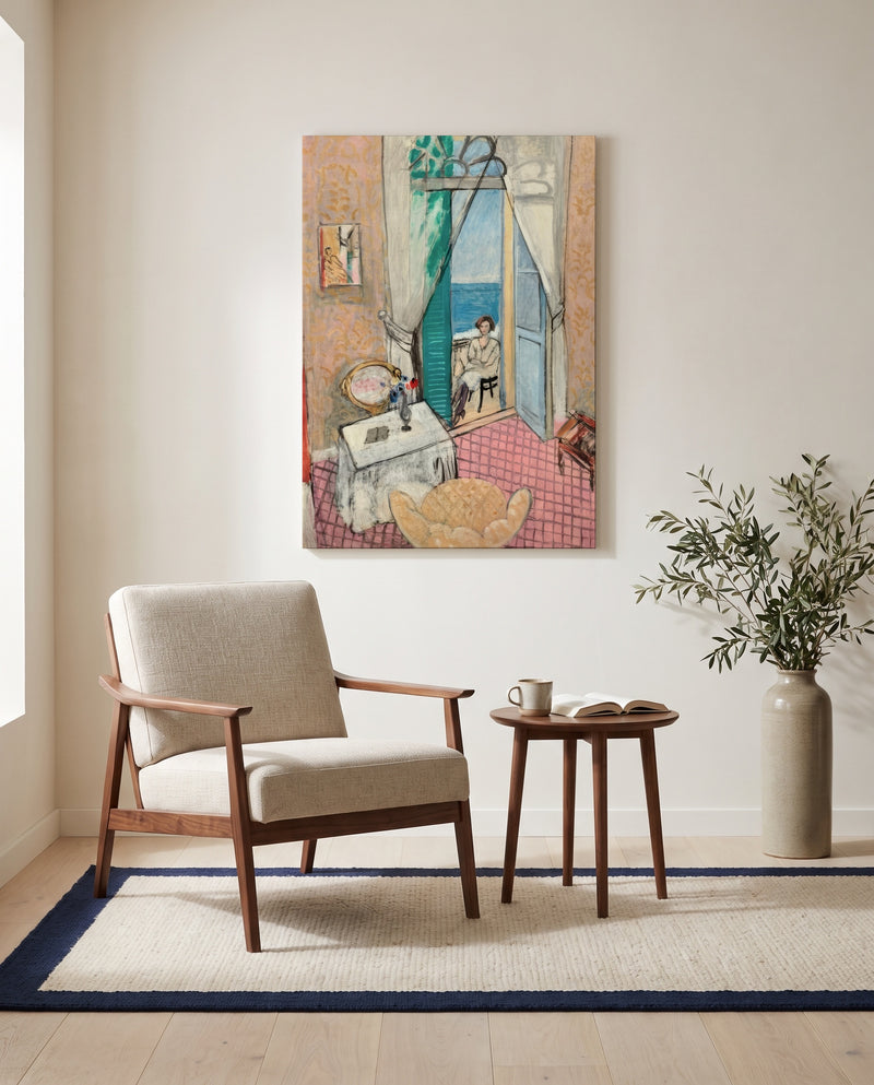 Interior at Nice by Henri Matisse as a stretched canvas above a linen lounge chair in a reading corner
