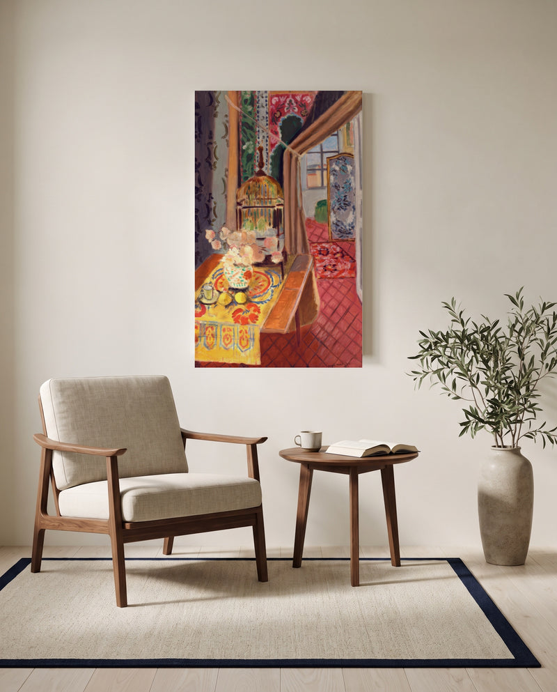 Flowers and Parakeets by Henri Matisse as a stretched canvas above a linen lounge chair in a reading corner