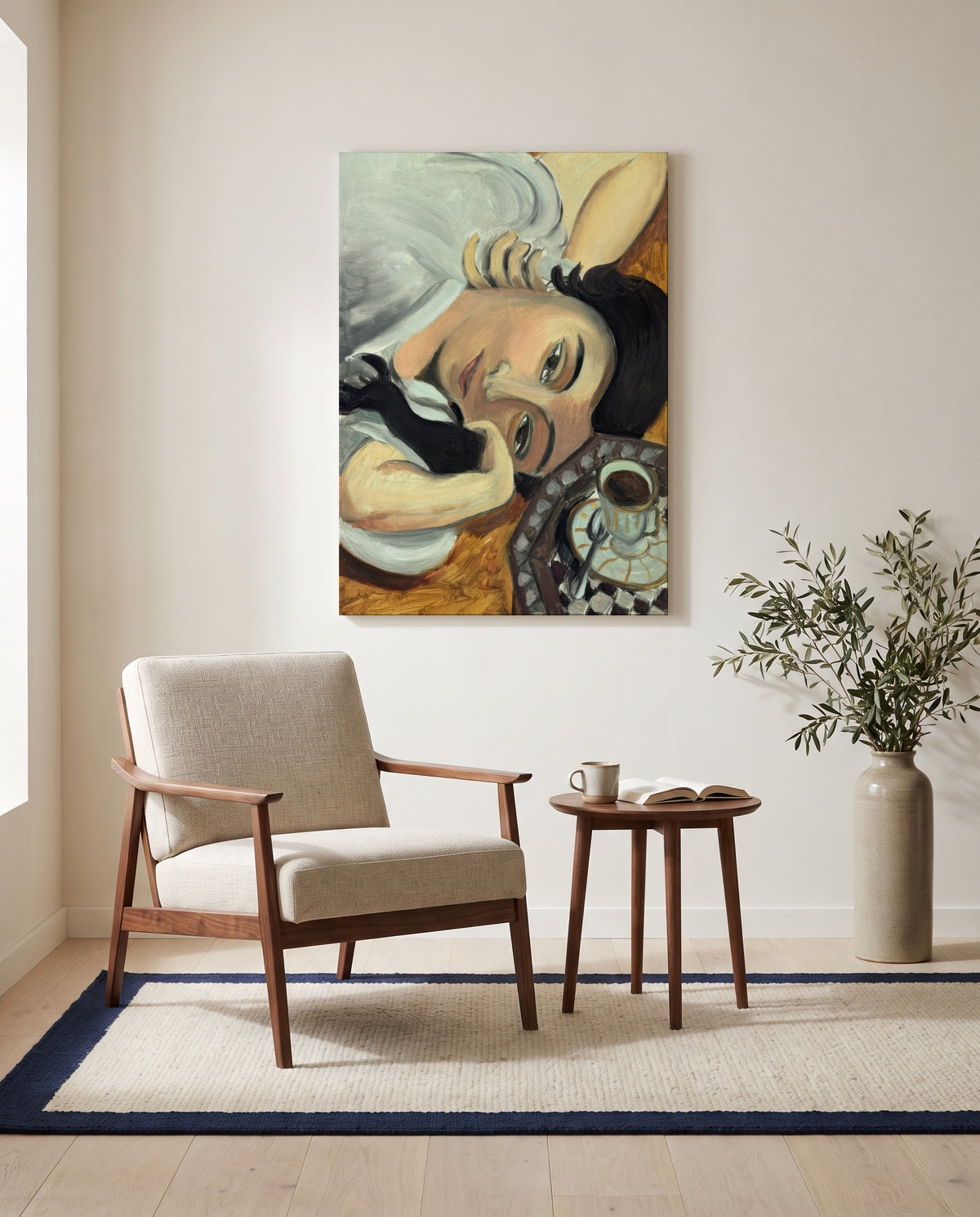 Laurette with Coffee by Henri Matisse as a stretched canvas above a linen lounge chair in a reading corner