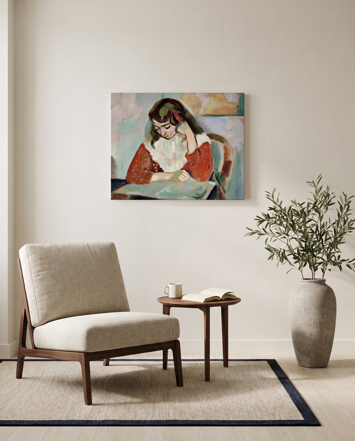 Marguerite Reading by Henri Matisse as a stretched canvas above a linen lounge chair in a reading corner