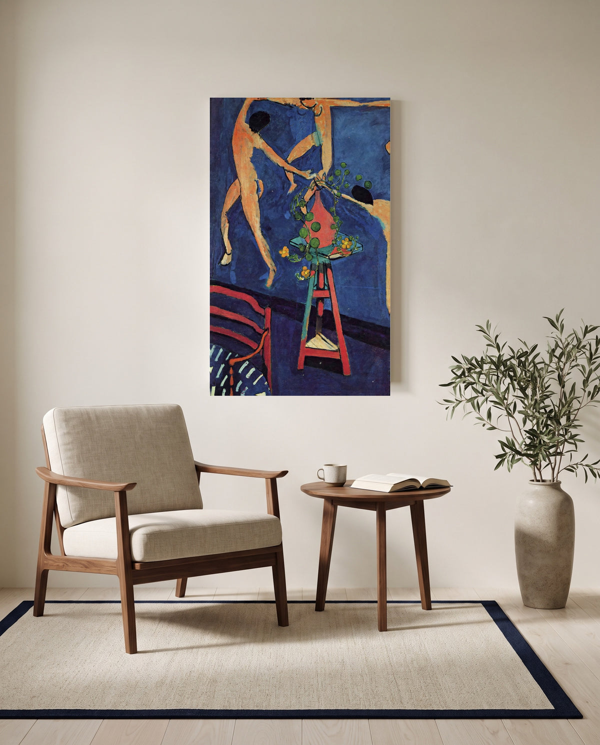 Nasturtiums with The Dance by Henri Matisse as a stretched canvas above a linen lounge chair in a reading corner