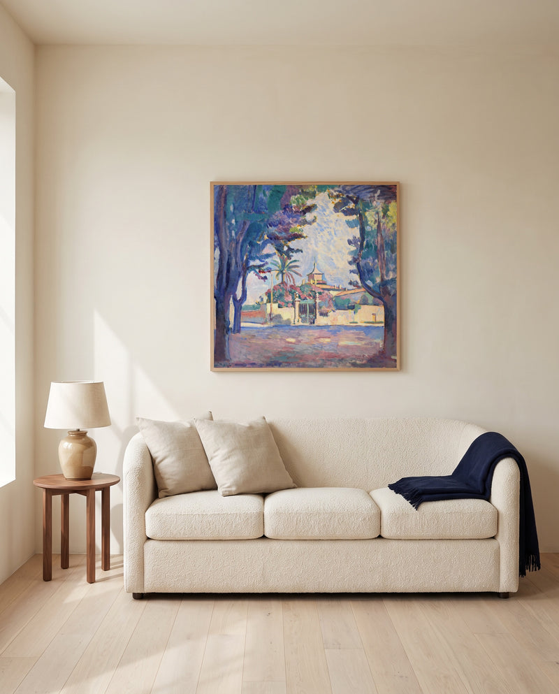 Place des Lices by Henri Matisse framed in natural oak above a cream sofa in a warm living room