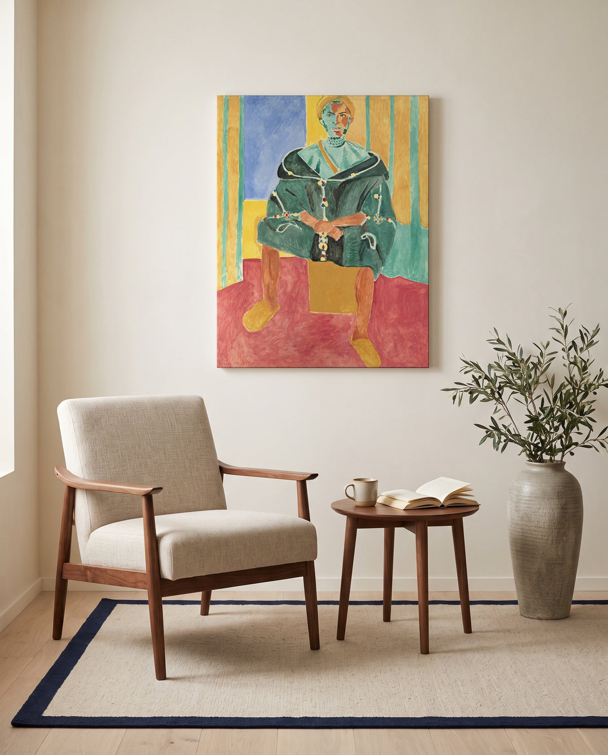 Seated Riffian by Henri Matisse as a stretched canvas above a linen lounge chair in a reading corner
