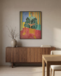 Seated Riffian by Henri Matisse in a black frame above a walnut sideboard in a dining room
