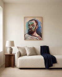 Self-Portrait (1906) by Henri Matisse framed in natural oak above a cream sofa in a warm living room