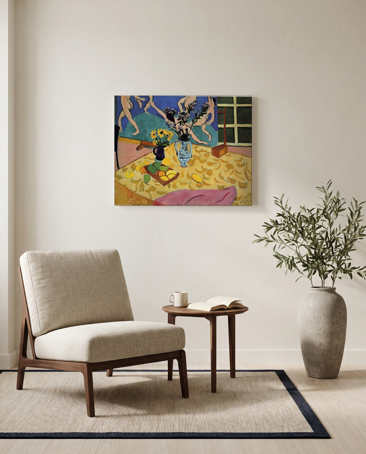 Still Life with Dance by Henri Matisse as a stretched canvas above a linen lounge chair in a reading corner