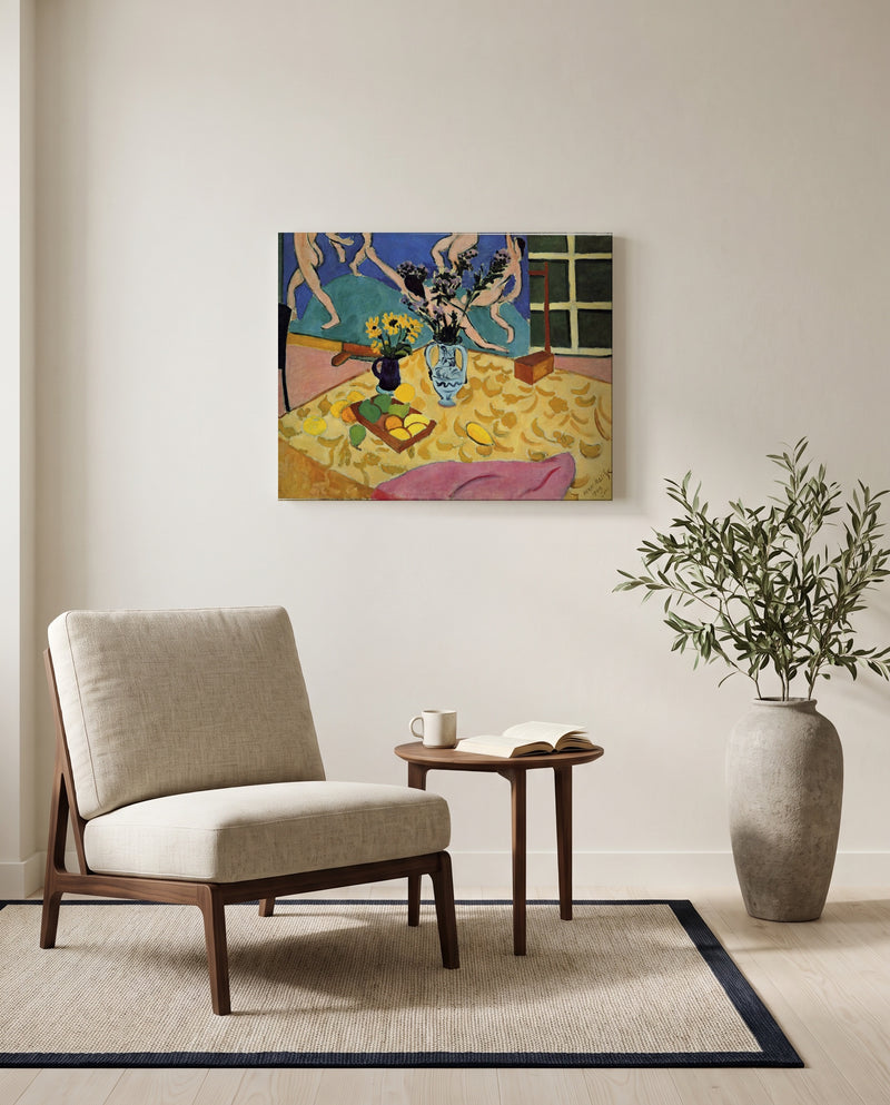 Still Life with Dance by Henri Matisse as a stretched canvas above a linen lounge chair in a reading corner