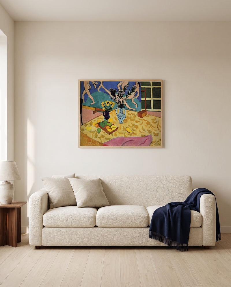 Still Life with Dance by Henri Matisse framed in natural oak above a cream sofa in a warm living room