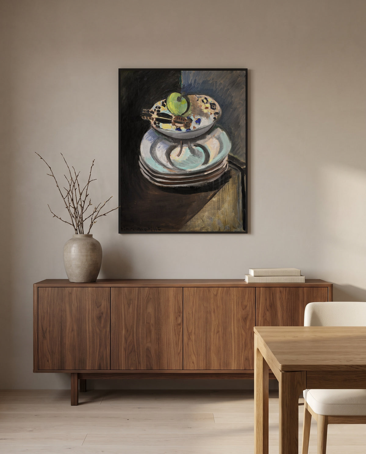 Fruit Bowl and Nutcracker by Henri Matisse in a black frame above a walnut sideboard in a dining room