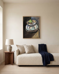 Fruit Bowl and Nutcracker by Henri Matisse framed in natural oak above a cream sofa in a warm living room