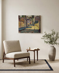 Street in Arcueil by Henri Matisse as a stretched canvas above a linen lounge chair in a reading corner