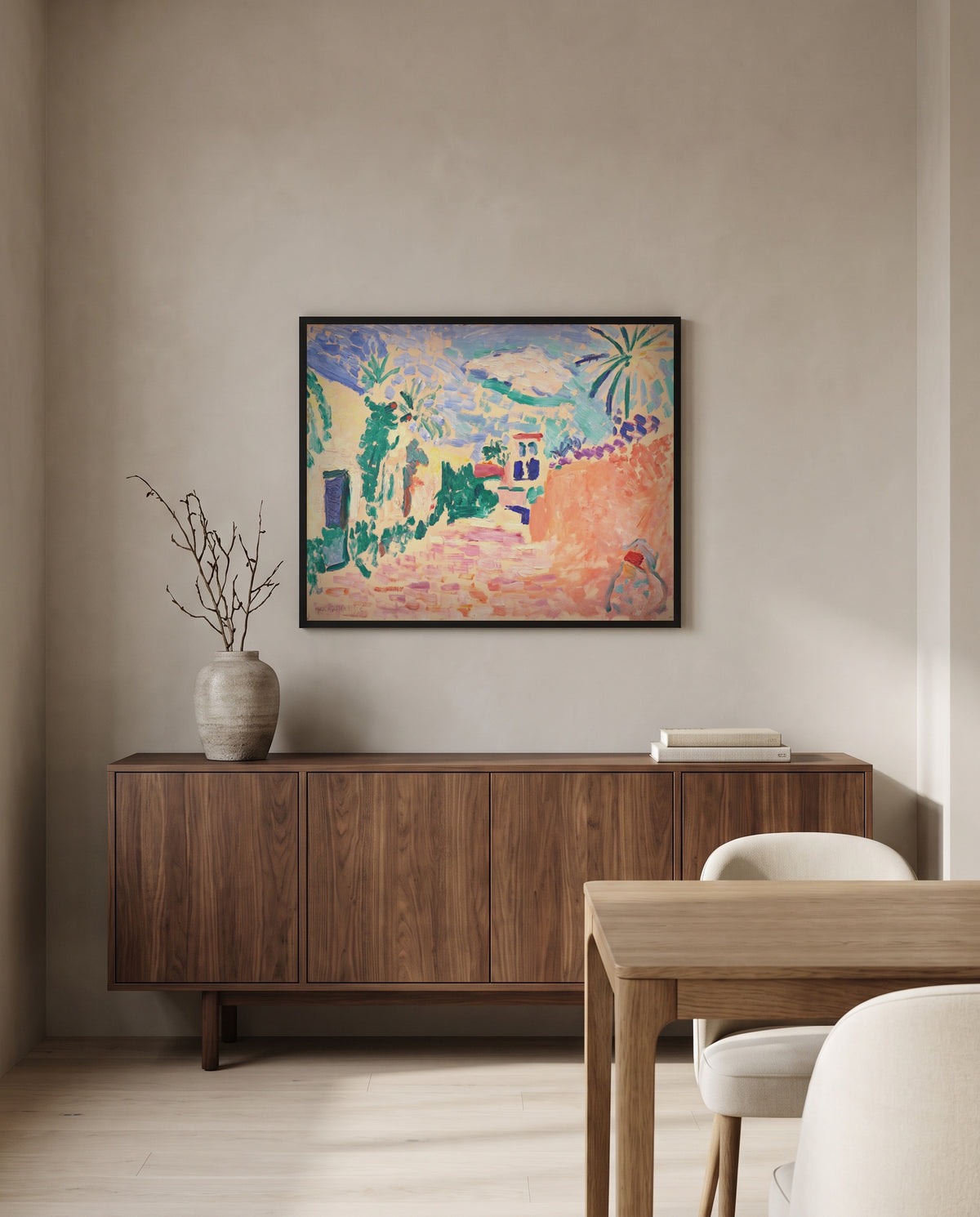 Street in Biskra by Henri Matisse in a black frame above a walnut sideboard in a dining room