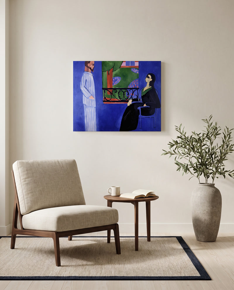 The Conversation by Henri Matisse as a stretched canvas above a linen lounge chair in a reading corner
