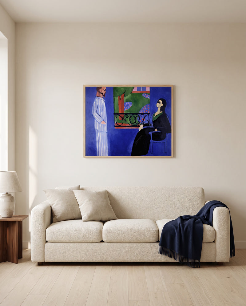 The Conversation by Henri Matisse framed in natural oak above a cream sofa in a warm living room