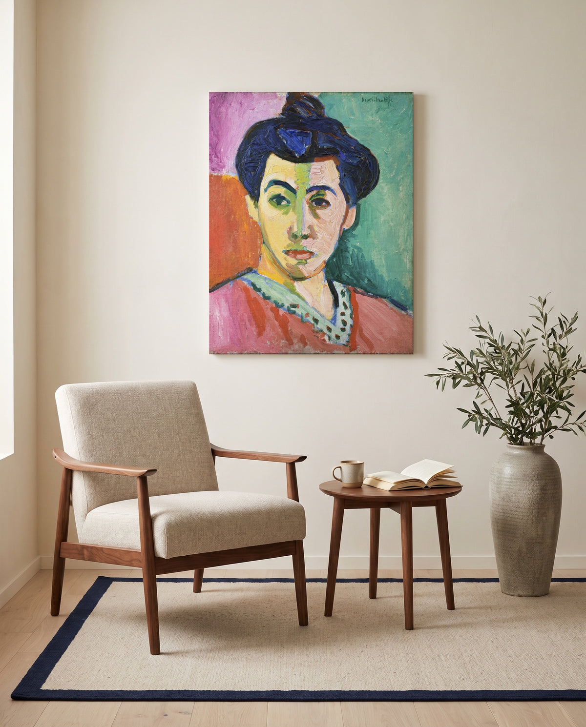 The Green Stripe by Henri Matisse as a stretched canvas above a linen lounge chair in a reading corner