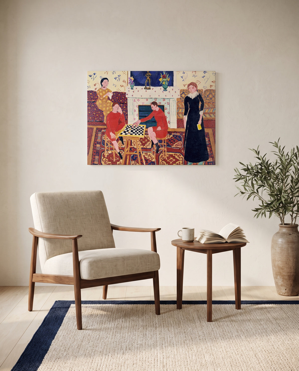 The Painter’s Family by Henri Matisse as a stretched canvas above a linen lounge chair in a reading corner
