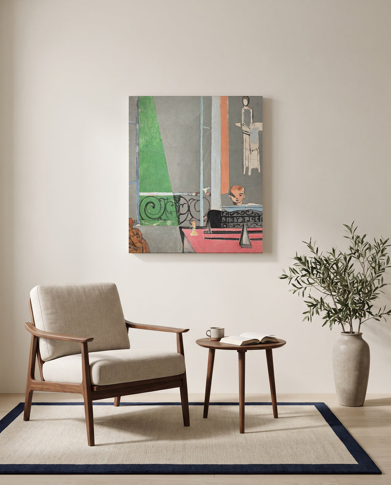 The Piano Lesson by Henri Matisse as a stretched canvas above a linen lounge chair in a reading corner