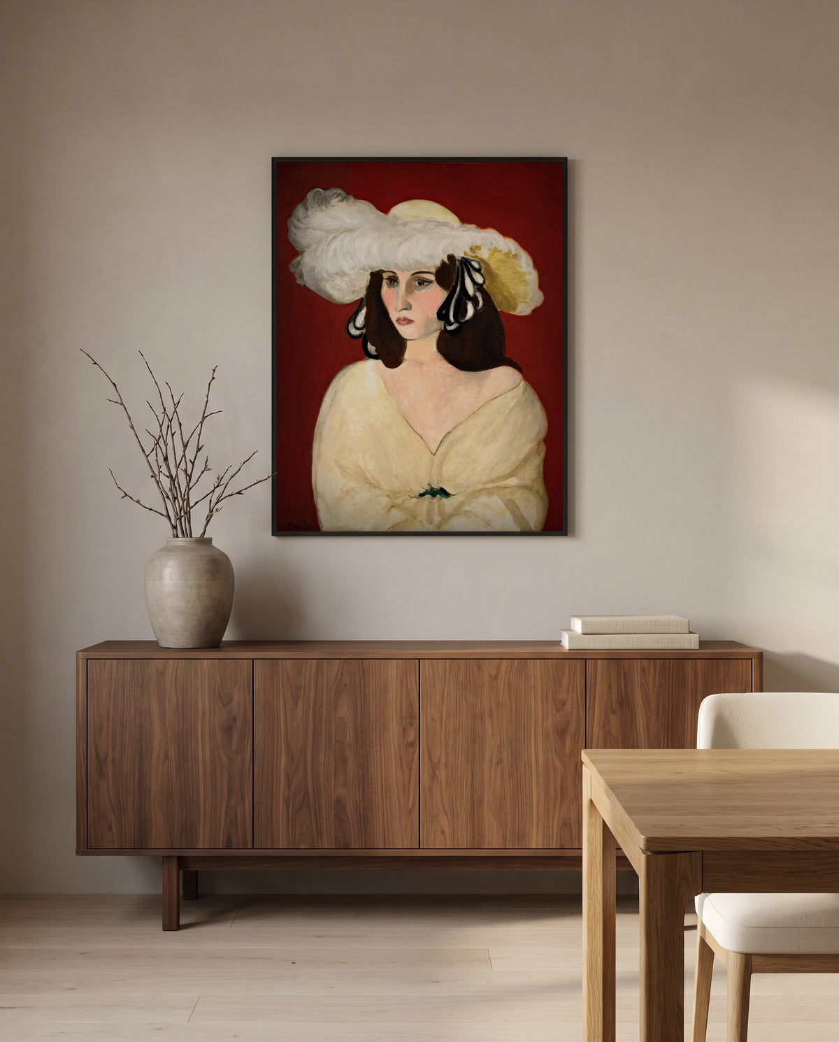 White Plumes by Henri Matisse in a black frame above a walnut sideboard in a dining room