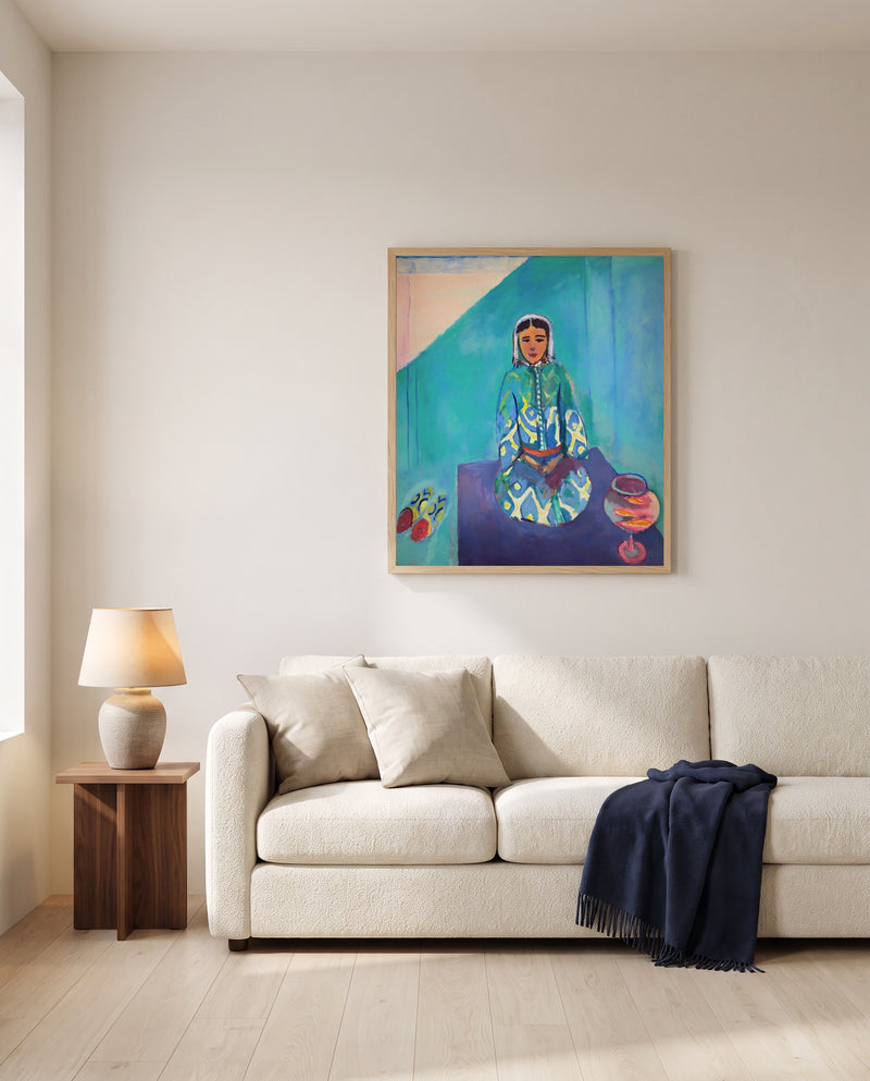 Zorah on the Terrace by Henri Matisse framed in natural oak above a cream sofa in a warm living room