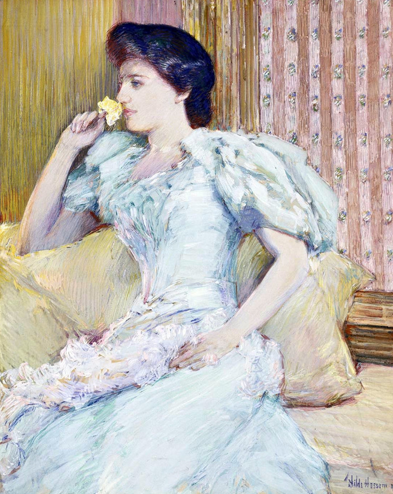Lillie Langtry by Childe Hassam: a woman in a pale blue gown with white fur on a yellow sofa, holding a yellow rose