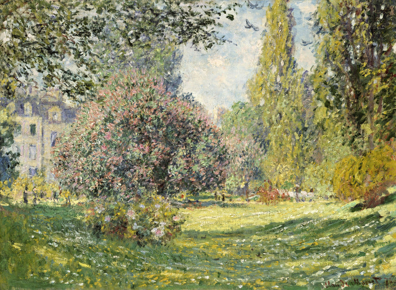 Landscape: The Parc Monceau by Claude Monet: a pink and white tree in flower on a sunlit lawn, Paris houses behind