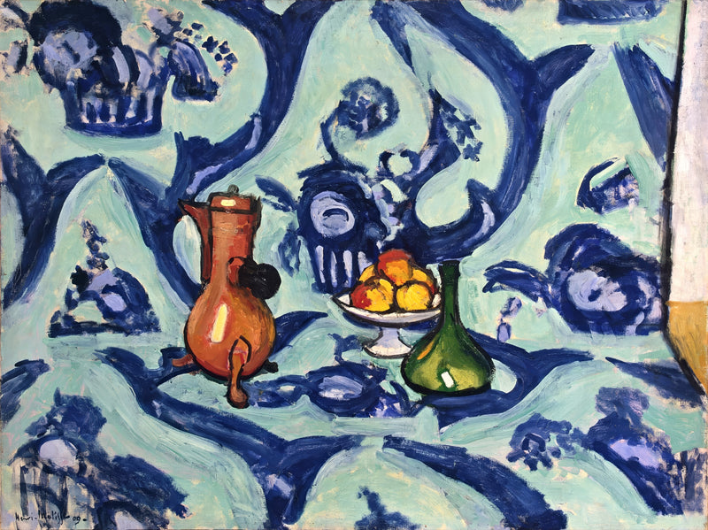 Still Life with Blue Tablecloth by Henri Matisse: a copper jug, a green bottle and fruit on a blue and white flowered cloth