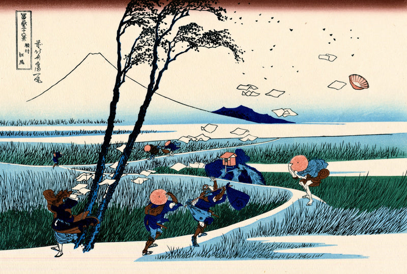 Ejiri in Suruga Province by Hokusai: travellers bent against the wind on a reedy road, papers flying, a white outline of Fuji