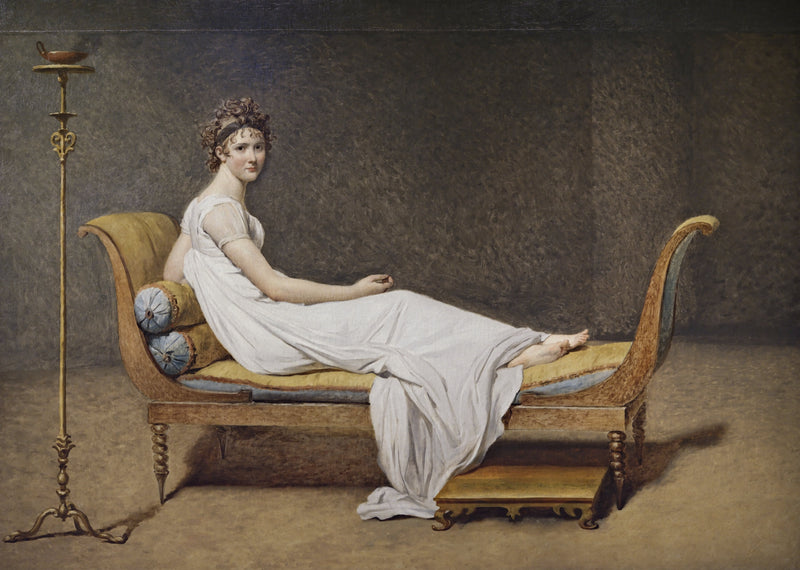 Portrait of Madame Récamier by Jacques-Louis David: a woman in a white dress reclining on a sofa beside a tall lamp