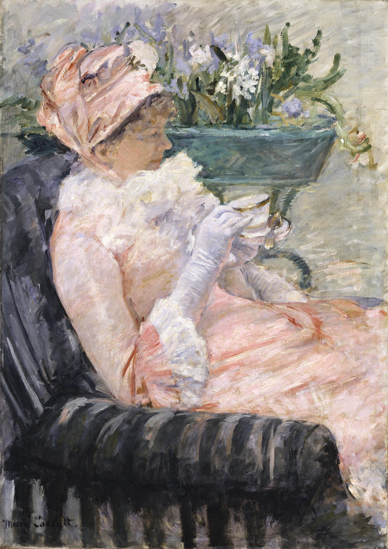 The Cup of Tea by Mary Cassatt: a woman in pink and a bonnet holding a teacup in a striped armchair, white flowers behind