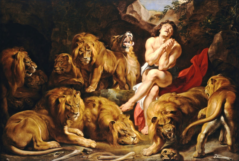Daniel in the Lions' Den by Rubens: a young man praying in a rocky den, surrounded by life-size lions and lionesses