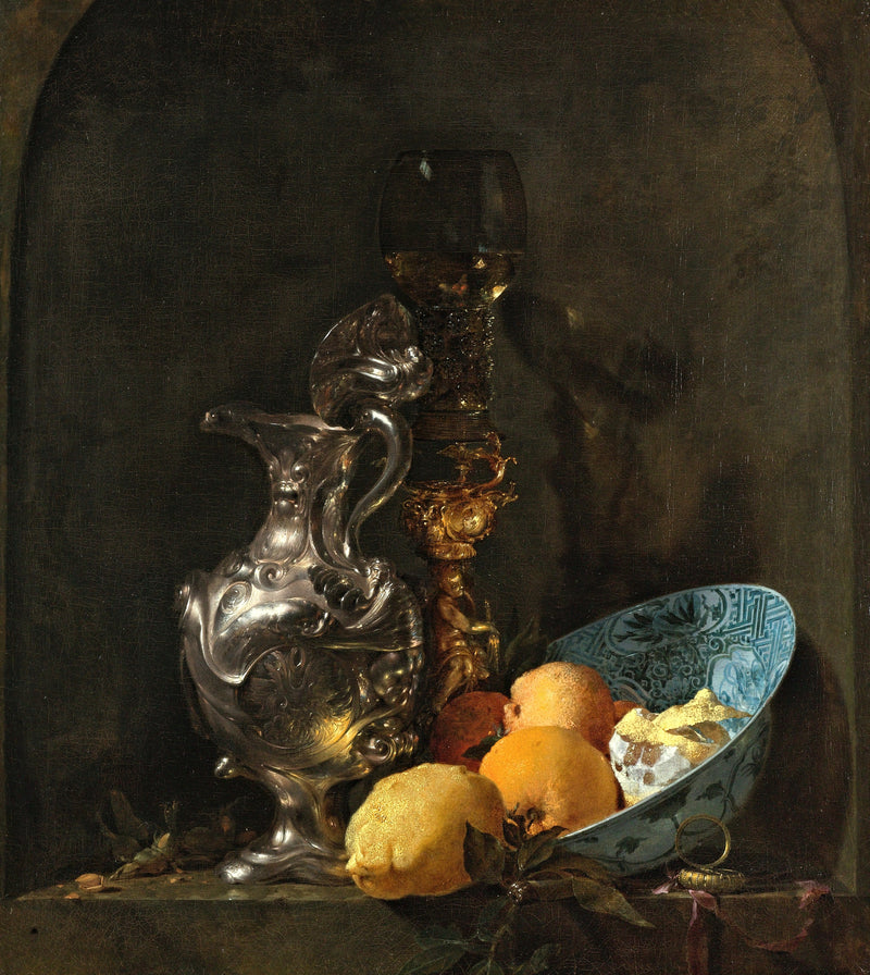 Still Life with a Silver Jug by Willem Kalf: a silver jug, a gilded wine glass and a porcelain bowl of lemons and oranges
