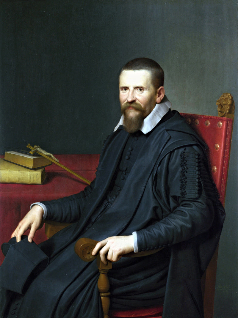 Portrait of Suitbertus Purmerent by van der Vliet: a bearded priest in black sits by a red table with books and a crucifix