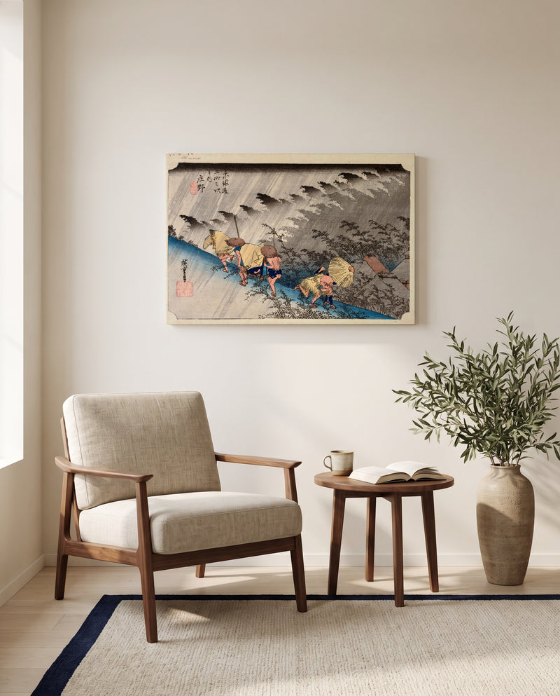 Driving Rain at Shōno by Utagawa Hiroshige as a stretched canvas above a linen lounge chair in a reading corner