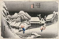 Evening Snow at Kambara by Hiroshige: a snow-covered village and hills under a dark sky, three figures walking in the snow