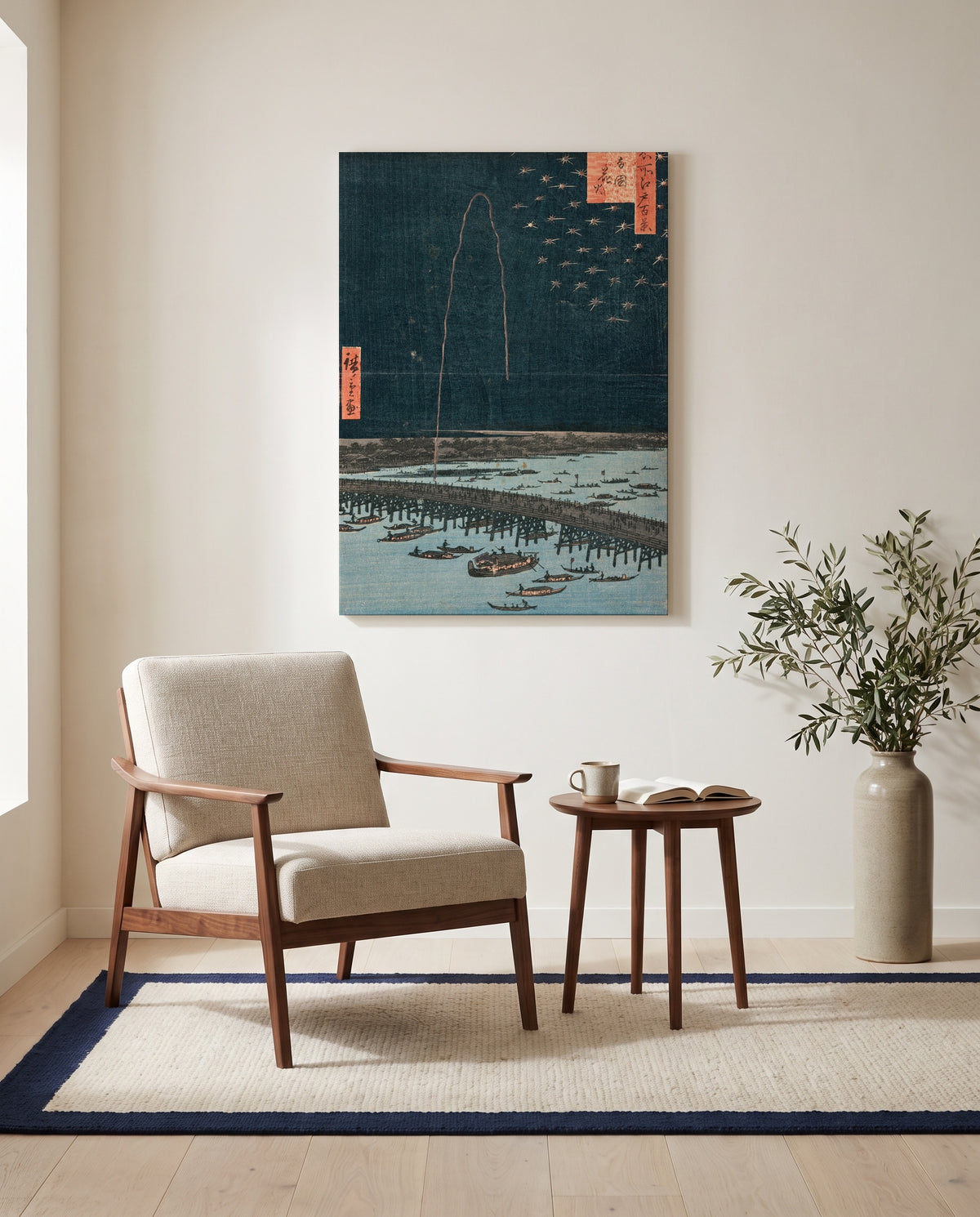 Fireworks at Ryōgoku by Utagawa Hiroshige as a stretched canvas above a linen lounge chair in a reading corner
