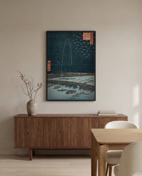 Fireworks at Ryōgoku by Utagawa Hiroshige in a black frame above a walnut sideboard in a dining room