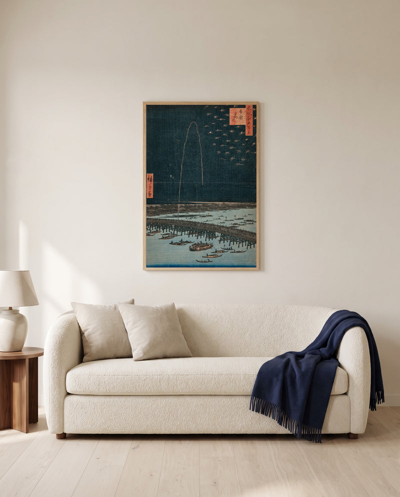 Fireworks at Ryōgoku by Utagawa Hiroshige framed in natural oak above a cream sofa in a warm living room