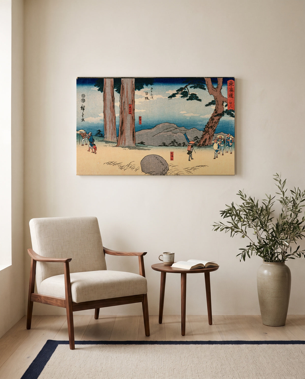 Night-Weeping Stone by Utagawa Hiroshige as a stretched canvas above a linen lounge chair in a reading corner