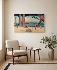 Night-Weeping Stone by Utagawa Hiroshige as a stretched canvas above a linen lounge chair in a reading corner
