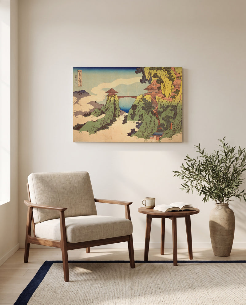 The Hanging-Cloud Bridge by Katsushika Hokusai as a stretched canvas above a linen lounge chair in a reading corner