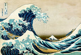 The Great Wave off Kanagawa by Hokusai: a towering blue wave curling over three boats, Mount Fuji small beyond