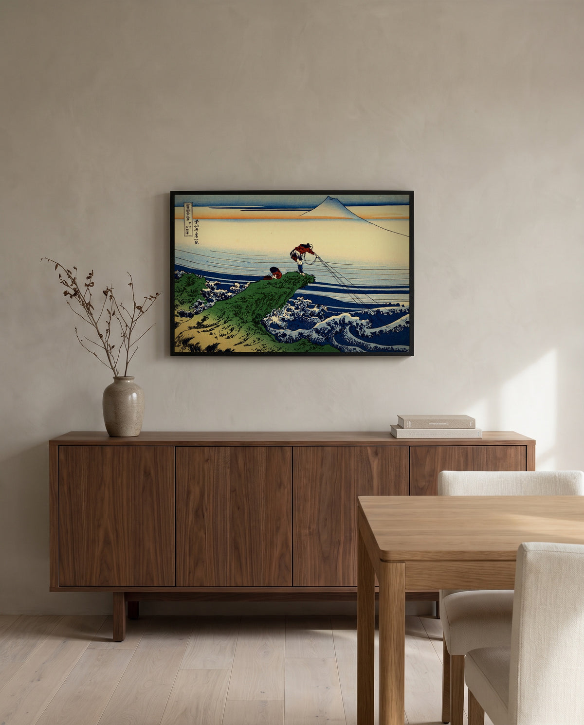 Kajikazawa in Kai Province by Katsushika Hokusai in a black frame above a walnut sideboard in a dining room