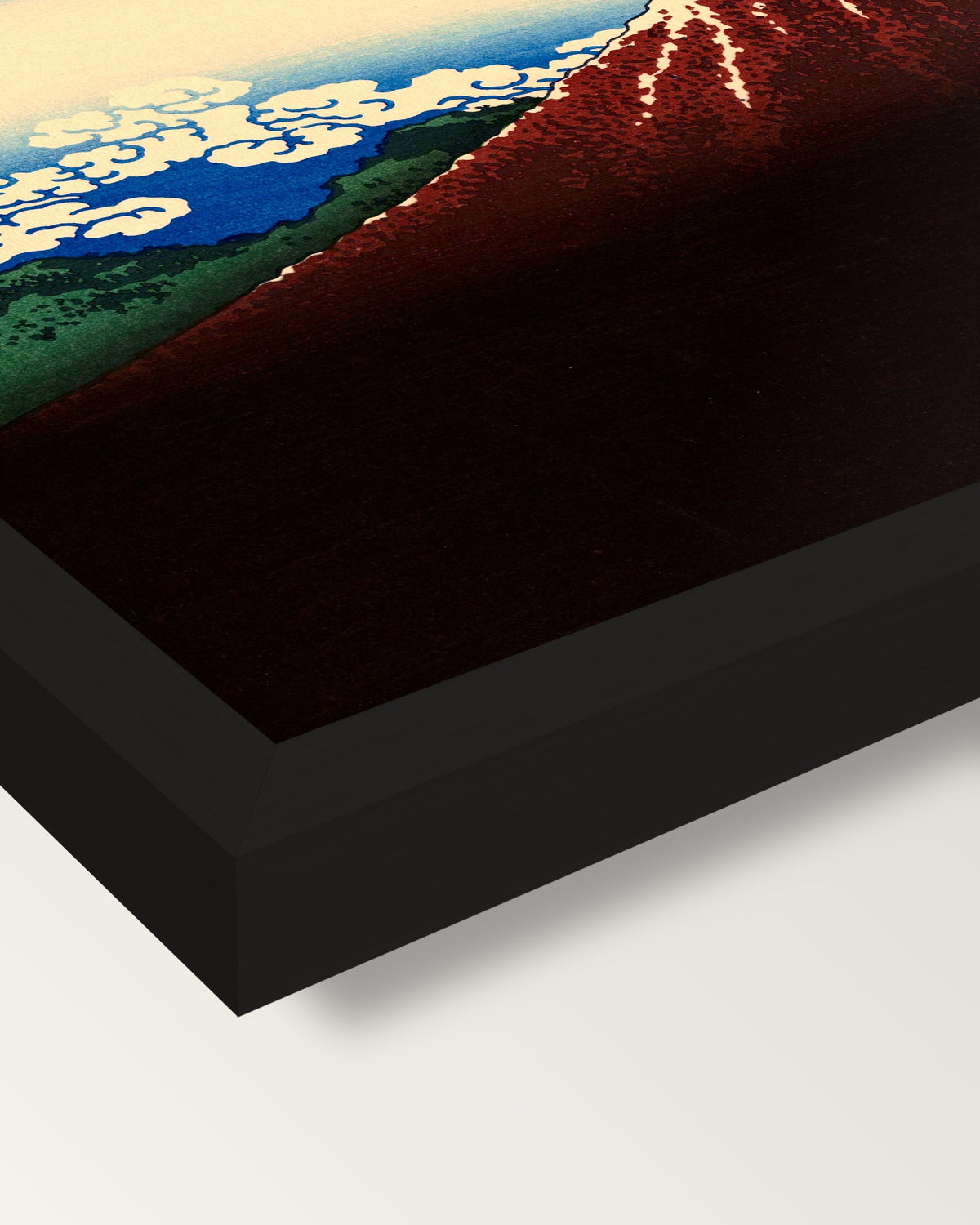 Thunderstorm Beneath the Summit framed print, corner close-up: black moulding, mitred, the print set just below its edge